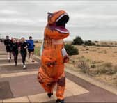 Arnie Delstanche is taking on a marathon in Norway in June for Cancer Research UK - dressed as a T-Rex