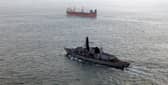 New technologies could be used to protect British waters from various threats. Pictured is HMS Somerset keeping a watchful eye over the Russian corvette Boikiy.