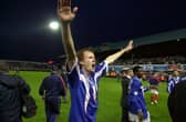 Former Pompey defender Hayden Foxe celebrates his side's Division One title win in 2003.