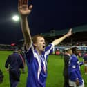 Former Pompey defender Hayden Foxe celebrates his side's Division One title win in 2003.