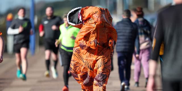 Arnie Delstanche battles through the Southsea Parkrun after the fan broke in his suit.