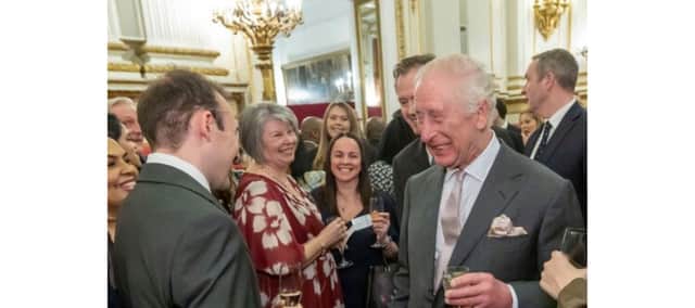 The moment Arnie told King Charles he would be running a marathon as a dinosaur for Cancer Research UK