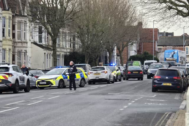 A taxi crashed into two parked cars on London Road this morning