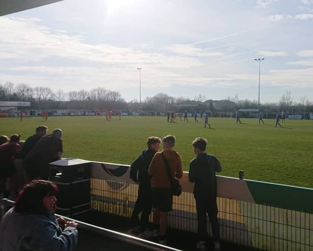 A man was escorted from the hospitality lounge at AFC Portchester after touching two teenage girls inappropriately. 