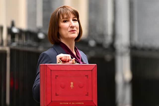 Rachel Reeves, poses with the red Budget Box as she leaves 11 Downing Street to present the government's annual budget to Parliament in October 2024 (Photo: Leon Neal/Getty Images)