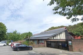 Police are calling for witnesses after a woman crashed into Bosmere Junior School before driving off and colliding with a marked police car.