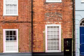 Behind this tiny door, is an absolutely phenomenal home that is the epitome of quirkiness. 