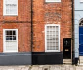 Behind this tiny door, is an absolutely phenomenal home that is the epitome of quirkiness. 