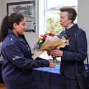 Pictured: HRH being presented with a posy of flowers by Miss Arrielle Deane, young crew member from the Royal Navy Sailing Association in Gosport.