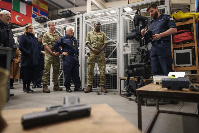 Adventurer Bear Grylls, former Portsmouth North MP Penny Mordaunt and other guests were given a tour of a Royal Navy base on Horsea Island - showcasing divers and their sophisticated equipment.
