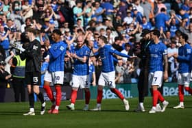 Pompey's Connor Ogilvie, third left, joins his team-mates to celebrate the win over Leeds. Pic: Graham Hunt/ProSportsImages
