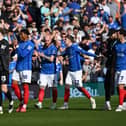 Pompey's Connor Ogilvie, third left, joins his team-mates to celebrate the win over Leeds. Pic: Graham Hunt/ProSportsImages