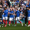 Pompey's Connor Ogilvie, third left, joins his team-mates to celebrate the win over Leeds. Pic: Graham Hunt/ProSportsImages