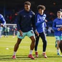 Kusini Yengi warms up ahead of Pompey's recent game against Luton at Kenilworth Road