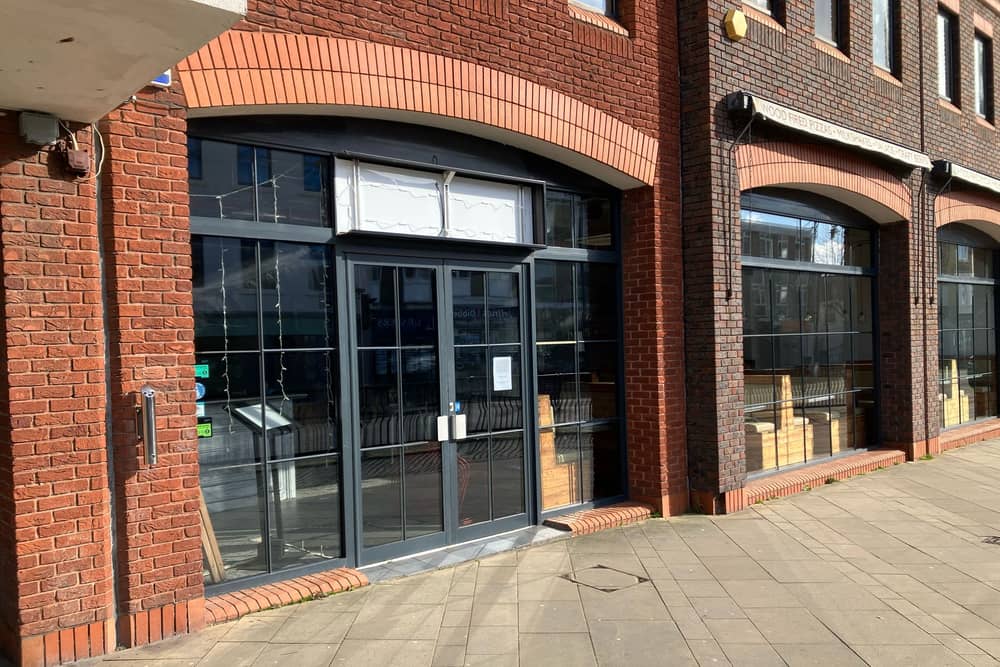 Signs for Salt & Sage Bistro have appeared at the former site of Three Joes