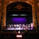 Visitors tour the theatre