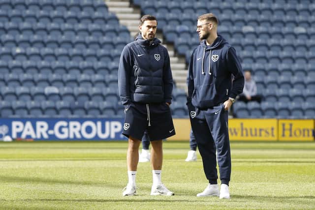 Alexander Milosevic, right, pictured with Marlon Pack, travelled to Preston North End on Saturday with the rest of the Pompey first-team squad