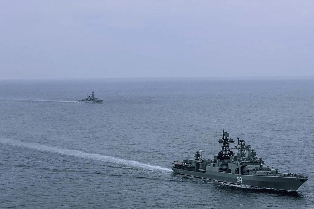 Royal Navy ships monitored a Russian taskforce sailing near Portsmouth carrying ammunition from Syria. PIctured is HMS Somerset sailing near destroyer RFN Severomorsk.