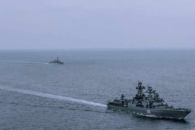 Royal Navy ships monitored a Russian taskforce sailing near Portsmouth carrying ammunition from Syria. PIctured is HMS Somerset sailing near destroyer RFN Severomorsk.
