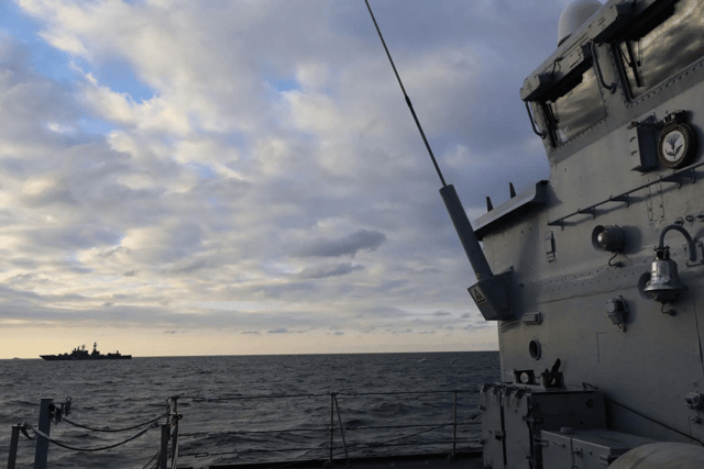 Portsmouth-based minehunter HMS Cattistock keeping an eye on Russian ships.