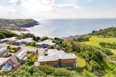 The Gower Peninsula in Swansea is one of the best places to live in the UK, according to the Sunday Times. This fabulous four-bedroom house looks out over Langland Bay, with its lovely sunny beach, and the nearby golf course.