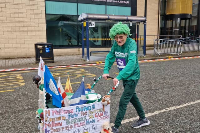 John Burkhill was taking part with his pram and green wig. Photo: David Kessen, National World