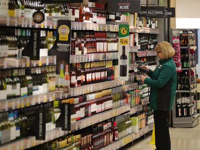 A member of staff scans groceries inside Rochdale's Morrisons supermarket in 2017 (Photo: Christopher Furlong/Getty Images)
