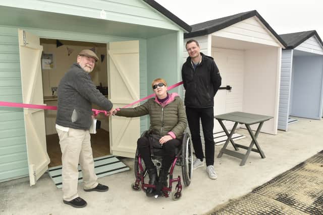 Pictured is: (l-r) David Evans who started the project, Laura Collinson, from the accessible beach huts group and Mark Collings, current seafront operations officer.Picture: Sarah Standing (240325-951)