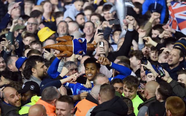 Happier times. Kusini Yengi celebrates with the fans after Pompey secured the 2023-24 League One title. Picture: Getty Images