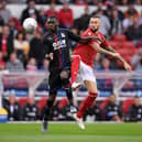 Pompey's Alex Milosevic, right, challenges Crystal Palace's Christian Benteke while with Nottingham Forest.  Pic: Getty Images