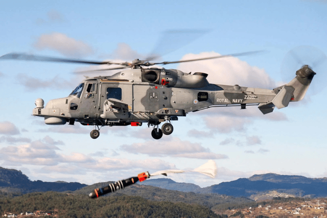 "Advanced techniques" have been developed between Royal Navy and Norwegian forces ahead of HMS Prince of Wales' upcoming Indo-Pacific deployment. Pictured: A Wildcat helicopter dropping a Sting Ray torpedo.