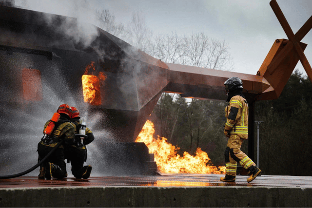 Sailors from 815 NAS practise firefighting at the Norwegian Damage Control School during Exercise Tamber Shield.