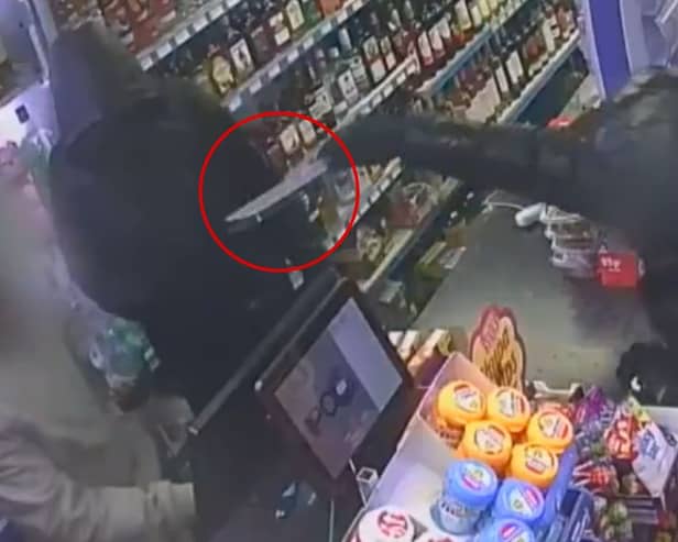 Balaclava-clad teen threatens shop owner at knifepoint.