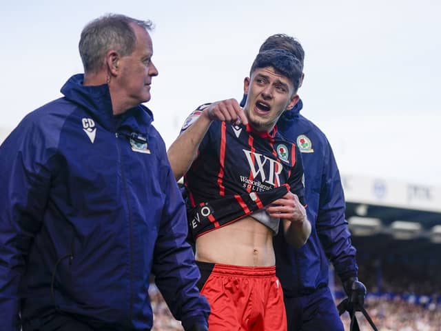 Blackburn defender Owen Beck signals Pompey are going down after forced off through injury in the 13th minute of their 1-0 defeat. Picture: Jason Brown/ProSportsImages