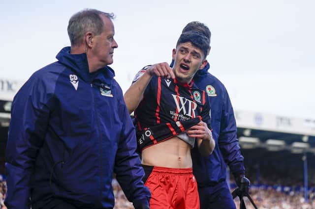 Blackburn defender Owen Beck signals Pompey are going down after forced off through injury in the 13th minute of their 1-0 defeat. Picture: Jason Brown/ProSportsImages
