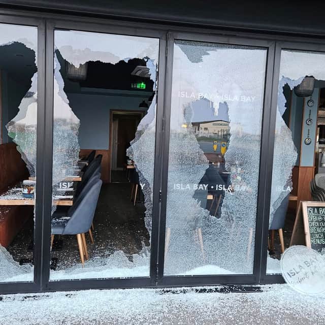 The windows of the Isla Bay restaurant were smashed overnight.