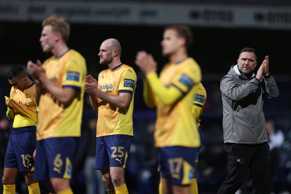 Derby boss John Eustace with his Rams players
