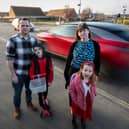 The Mahaffey family, James and Lisa with their children, Rhys, 9, and Freya, 6. They are calling for better road safety measures outside Berewood Primary School, Waterlooville, after their children were nearly hit by a speeding driver while on their way to school.