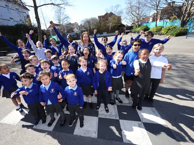 St Swithun’s Catholic Primary School is celebrating a positive Ofsted report. 

Pictured: Headteacher Jenifer Verhiest with children from the school in Portsmouth

Picture: Sam Stephenson