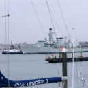 Royal Navy frigate HMS Monmouth has left Portsmouth for the final time as she is set to be scrapped in Turkey. Pictured is her being towed away from the city.