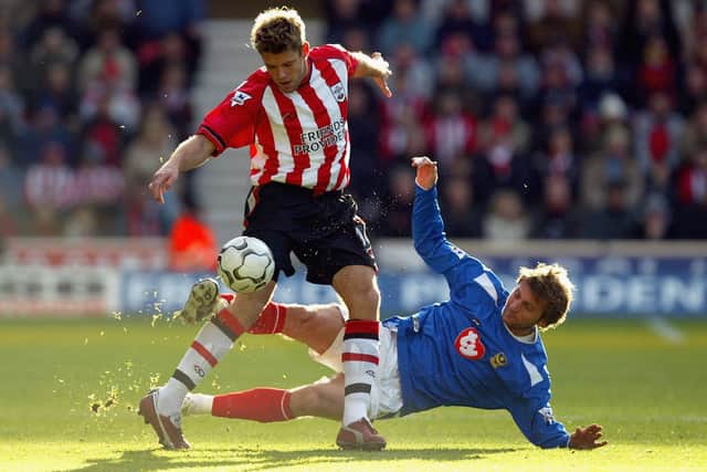 Former Pompey midfielder Tim Sherwood in Premier League action against Southampton in 2003.