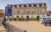 This home comes with three bedrooms, three bathrooms and two reception rooms as well as a garden. 