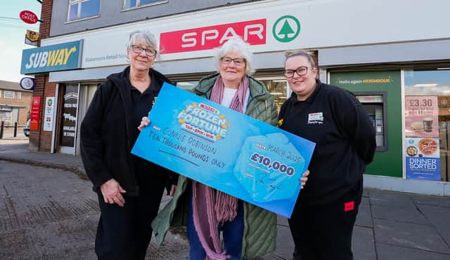 Connie Robinson collected the cheque from SPAR New Waltham, Grimsby, on behalf of a friend