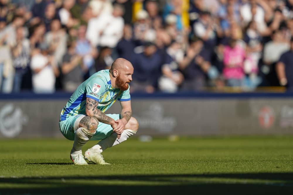 Connor Ogilvie looks dejected at the final whistle