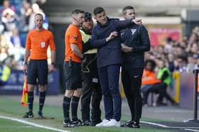 John Mousinho made a complaint to referee Ben Toner and fourth official Alan Dale after claiming he heard 'discriminatory language' from Millwall fans. Picture: Jason Brown/ProSportsImages
