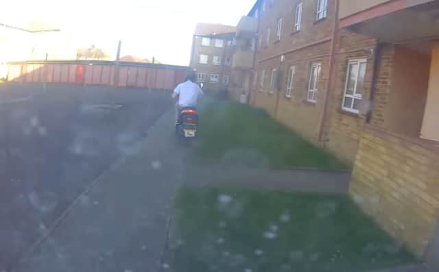 Motorcyclist riding on the pavement in Havant