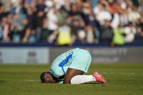 Christian Saydee agonises over yet another Pompey defeat on their travels, this time at Millwall on Saturday. Picture: Jason Brown/ProSportsImages