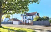 This four bedroom home comes with two bathrooms and three reception rooms. 
