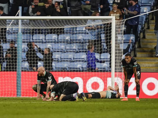 Pompey are floored by Coventry's 94th-minute winner last night. Pic: Jason Brown/ProSportsImages