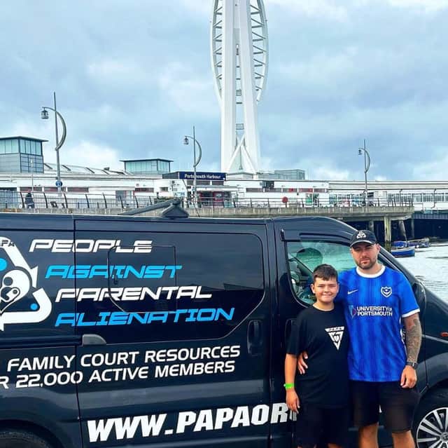 Simon Cobb with his son in front of the Spinnaker Tower. The Portsmouth landmark will light up green on April 25 to mark Parental Alienation Awareness Day.